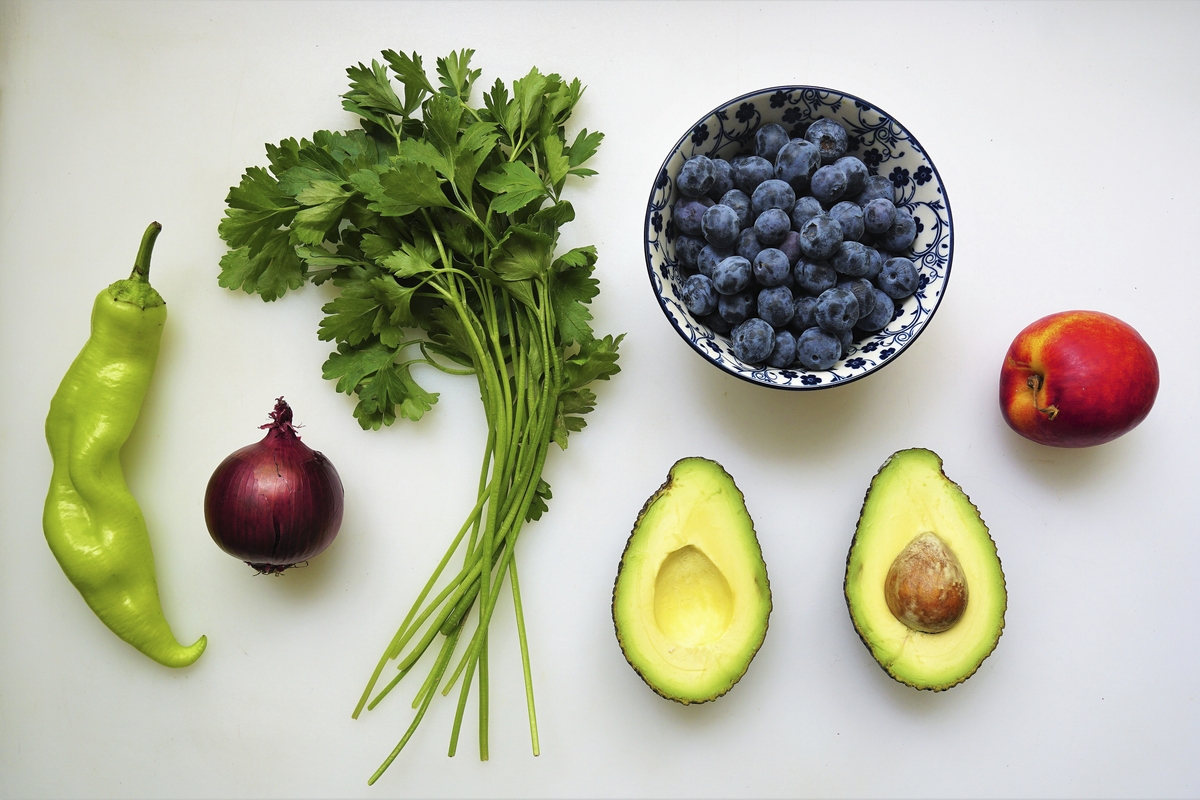 Assortment of testosterone-boosting superfoods on a wooden table